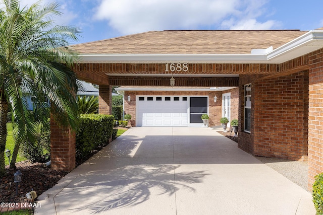 garage featuring a carport