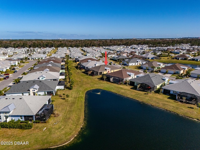 drone / aerial view featuring a water view