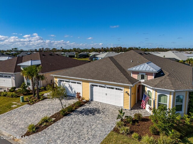 view of front of home with a garage