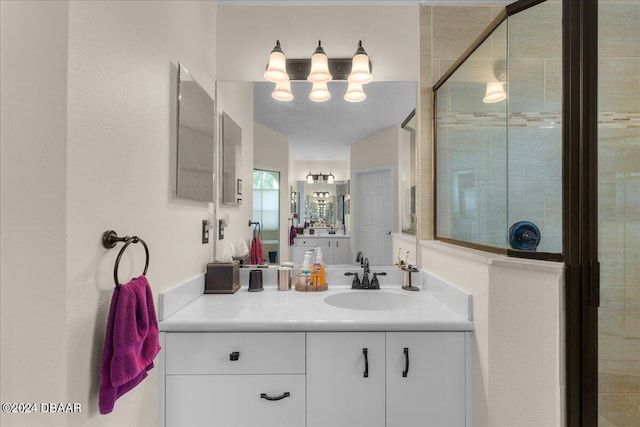 bathroom with an enclosed shower and vanity