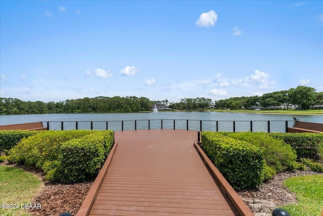 view of community with a water view