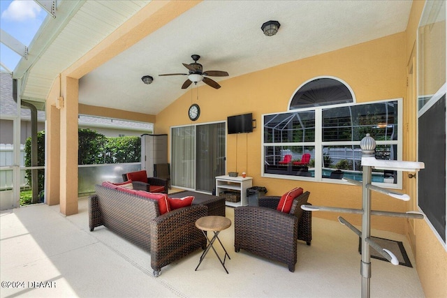 view of patio featuring ceiling fan and an outdoor living space