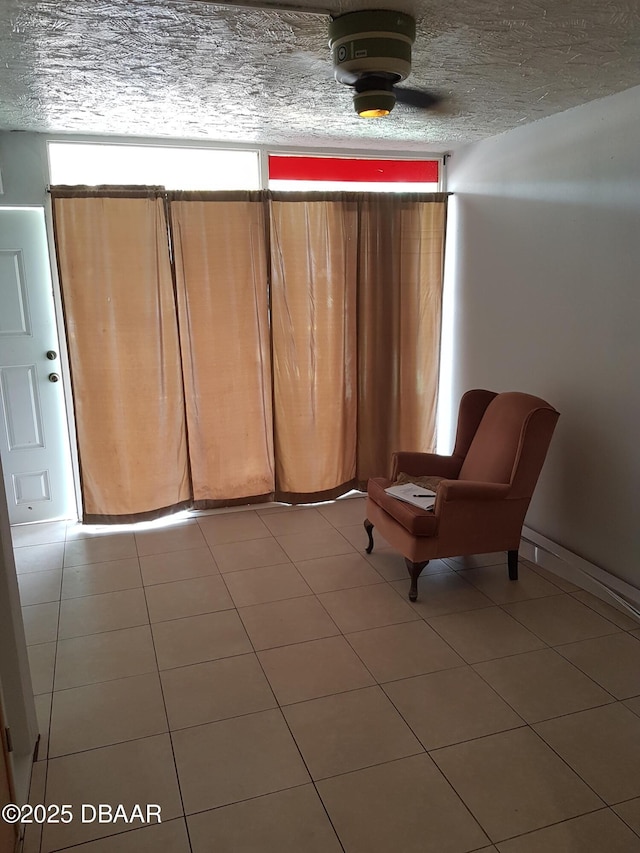 unfurnished room featuring light tile patterned floors