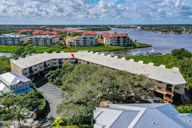 bird's eye view with a water view