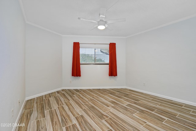 unfurnished room with ornamental molding, wood tiled floor, baseboards, and a ceiling fan