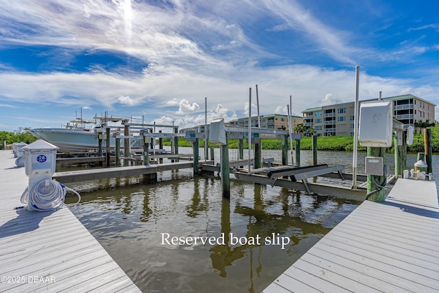 dock area featuring a water view and boat lift