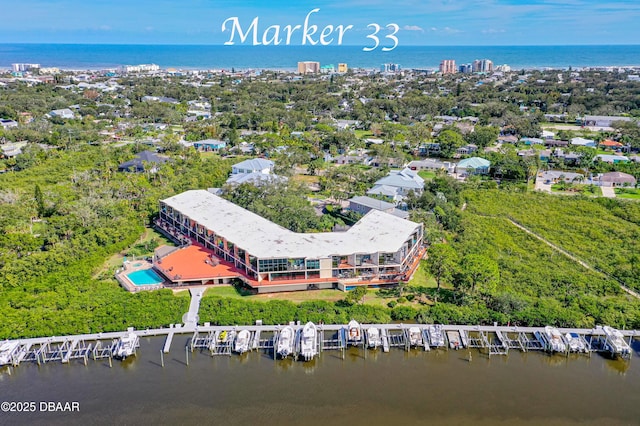 drone / aerial view featuring a water view