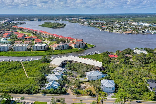 bird's eye view with a water view