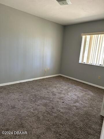 5808 Westport Dr, Port Orange, FL 32127 - unfurnished room with carpet and baseboards
