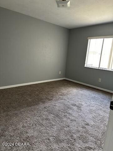 5808 Westport Dr, Port Orange, FL 32127 - carpeted spare room with baseboards