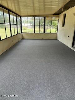 5808 Westport Dr, Port Orange, FL 32127 - unfurnished sunroom featuring healthy amount of natural light