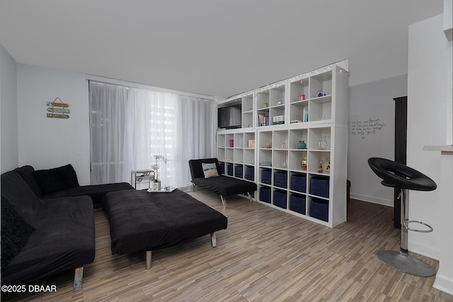 2800 N Atlantic Ave Unit 1105, Daytona Beach, FL 32118 - living area with light wood finished floors and baseboards