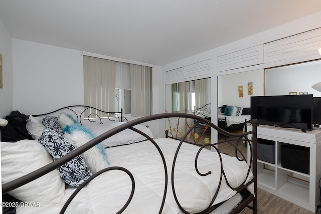 2800 N Atlantic Ave Unit 1105, Daytona Beach, FL 32118 - bedroom featuring wood finished floors