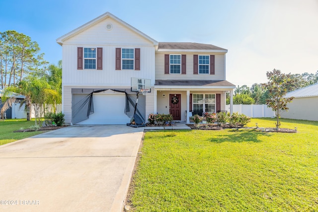 view of front of property featuring a garage, a porch, and a front lawn