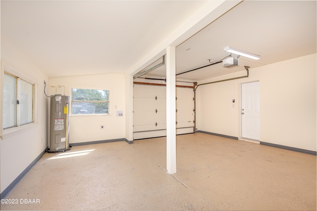 garage with water heater and a garage door opener