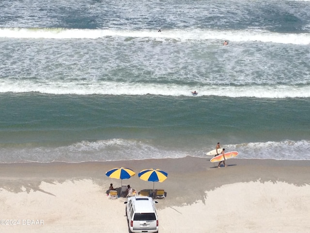 view of water feature featuring a beach view