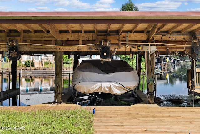 view of dock with a water view