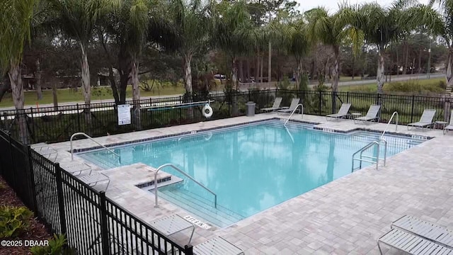 view of pool featuring a patio