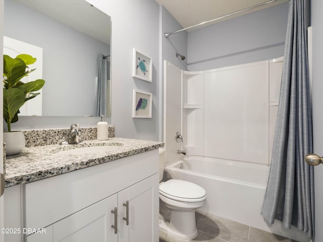 full bathroom featuring vanity, toilet, tile patterned floors, and shower / bath combo with shower curtain