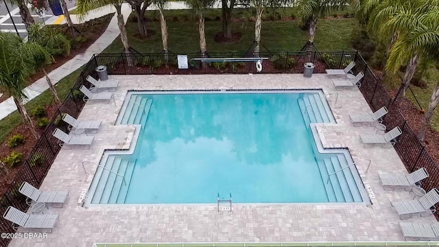 view of swimming pool featuring a patio area