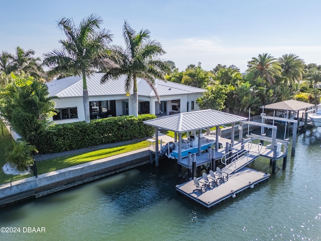 dock area with a water view