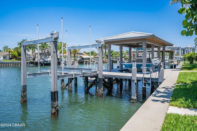 view of dock with a water view