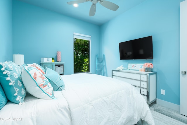 bedroom featuring ceiling fan and light wood-type flooring