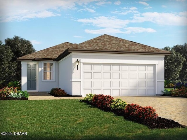 view of front of home featuring a garage and a front yard