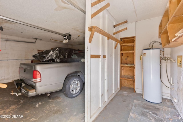 garage with gas water heater and concrete block wall