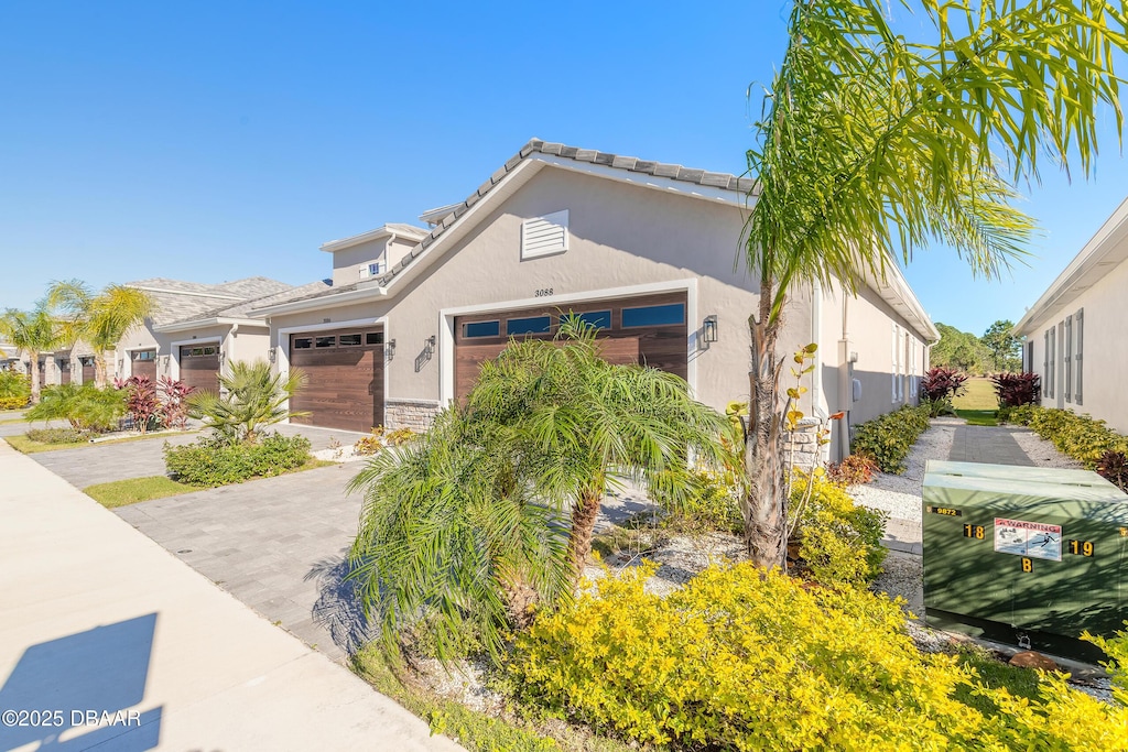 view of front of home with a garage