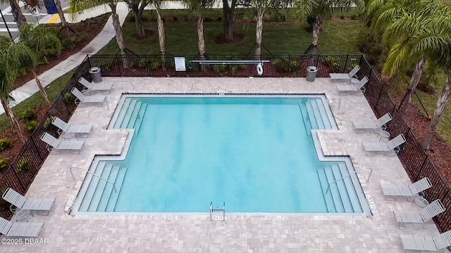 view of swimming pool featuring a patio