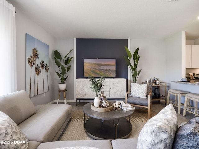 living room featuring tile patterned floors