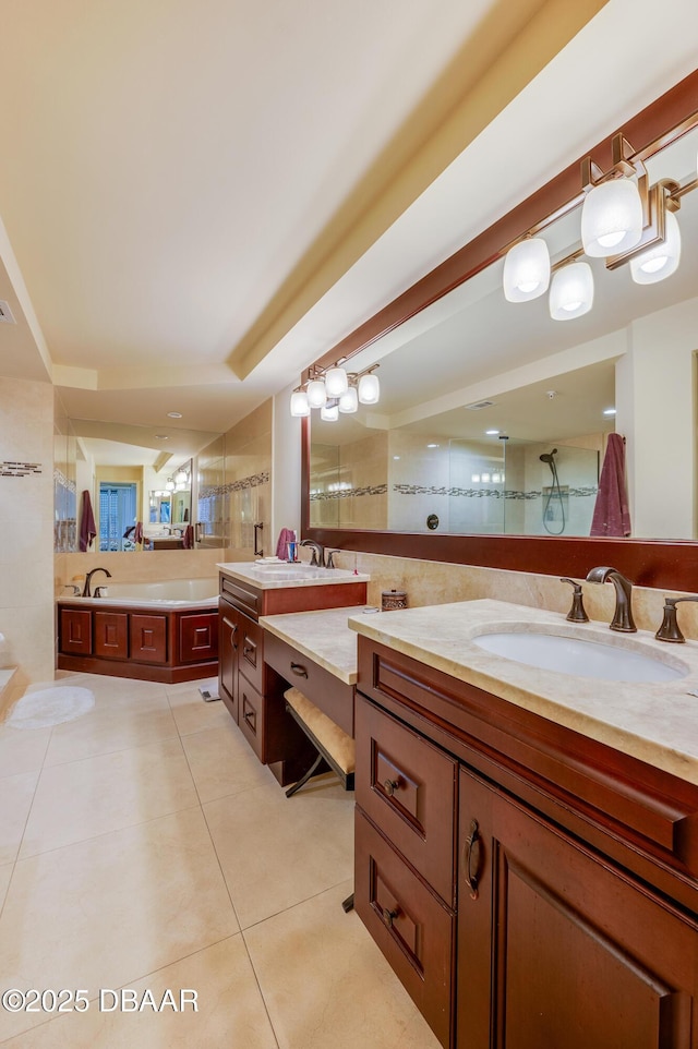 bathroom featuring vanity, tile patterned floors, and plus walk in shower