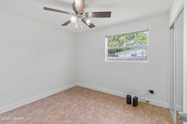 321 Scotland Dr, Holly Hill, FL 32117 - spare room with baseboards, a ceiling fan, and light wood-type flooring