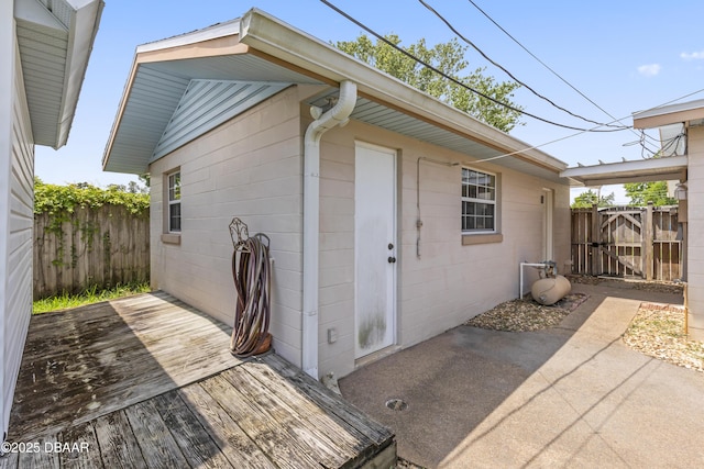 321 Scotland Dr, Holly Hill, FL 32117 - doorway to property with a gate and a deck