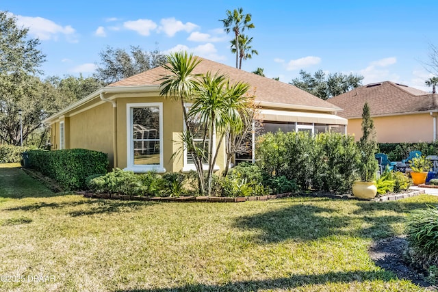 4 Arika At Lionspaw, Daytona Beach, FL 32124 - view of front of home with stucco siding and a front lawn