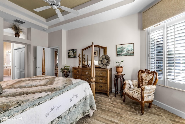 4 Arika At Lionspaw, Daytona Beach, FL 32124 - bedroom with multiple windows, light wood-style floors, ensuite bath, and ceiling fan
