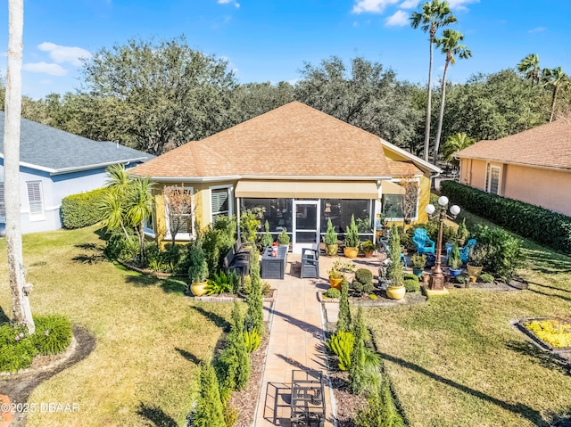 4 Arika At Lionspaw, Daytona Beach, FL 32124 - back of property featuring a patio, a lawn, and a shingled roof
