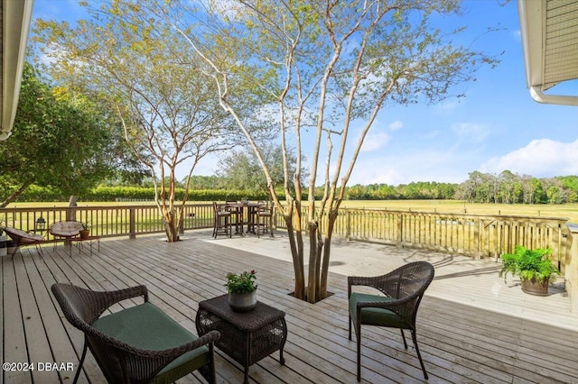 deck featuring a rural view