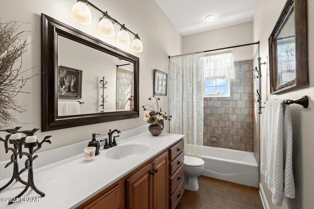 full bathroom featuring tile patterned flooring, vanity, shower / bath combo, and toilet