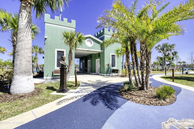 exterior space with concrete driveway