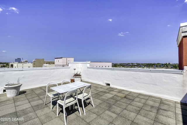 view of patio with a view of city