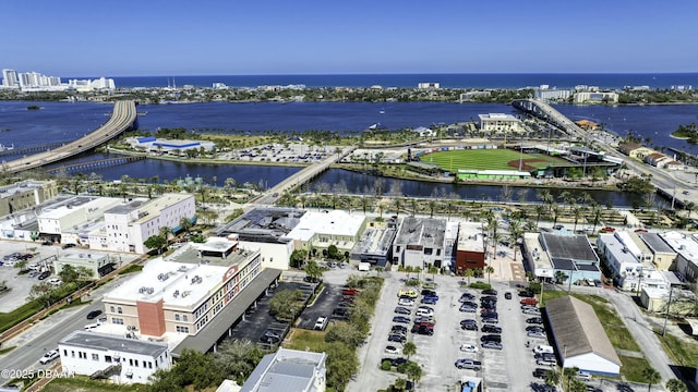 aerial view with a city view and a water view