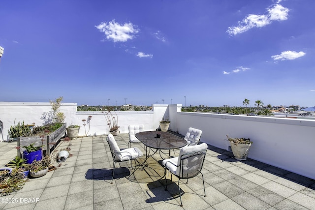 view of patio with outdoor dining area