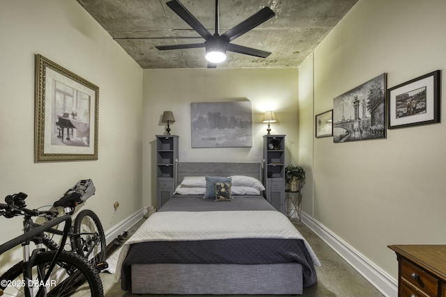 bedroom featuring baseboards and ceiling fan