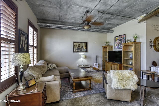 living area featuring ceiling fan