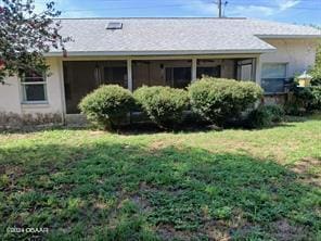 exterior space featuring a lawn