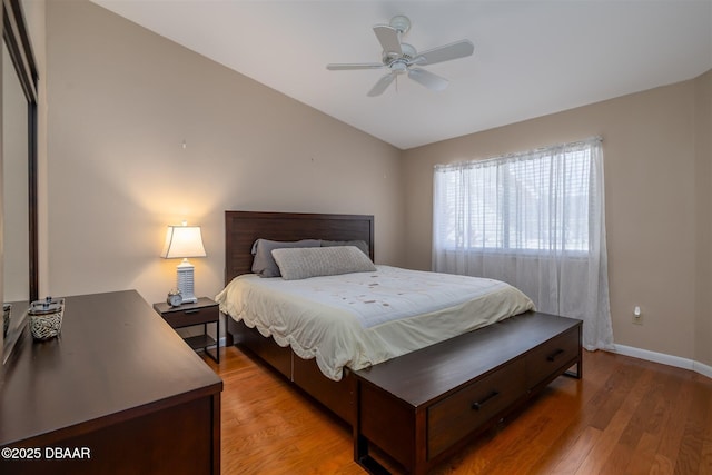 18 Landings Ln, Ormond Beach, FL 32174 - bedroom featuring vaulted ceiling, light wood-style flooring, baseboards, and ceiling fan