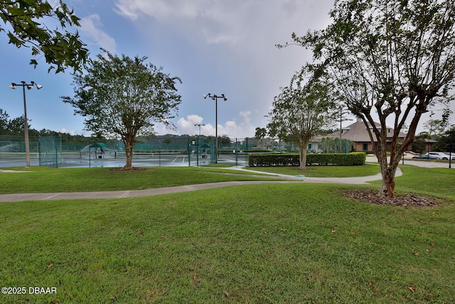18 Landings Ln, Ormond Beach, FL 32174 - surrounding community with a tennis court