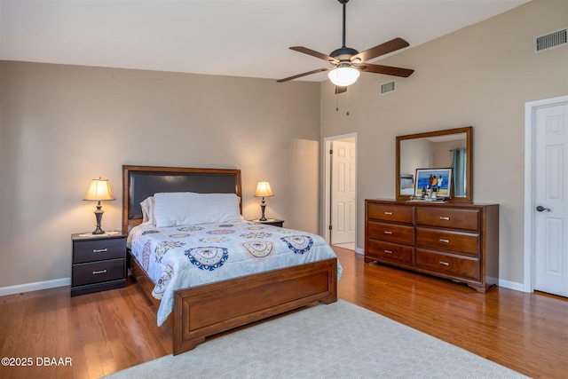 18 Landings Ln, Ormond Beach, FL 32174 - bedroom with wood finished floors, high vaulted ceiling, baseboards, and ceiling fan